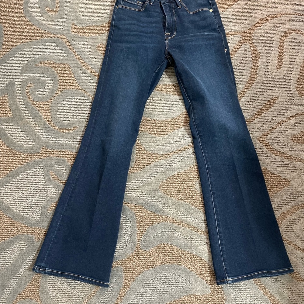 Frame mid-rise slight flare jeans. Never worn